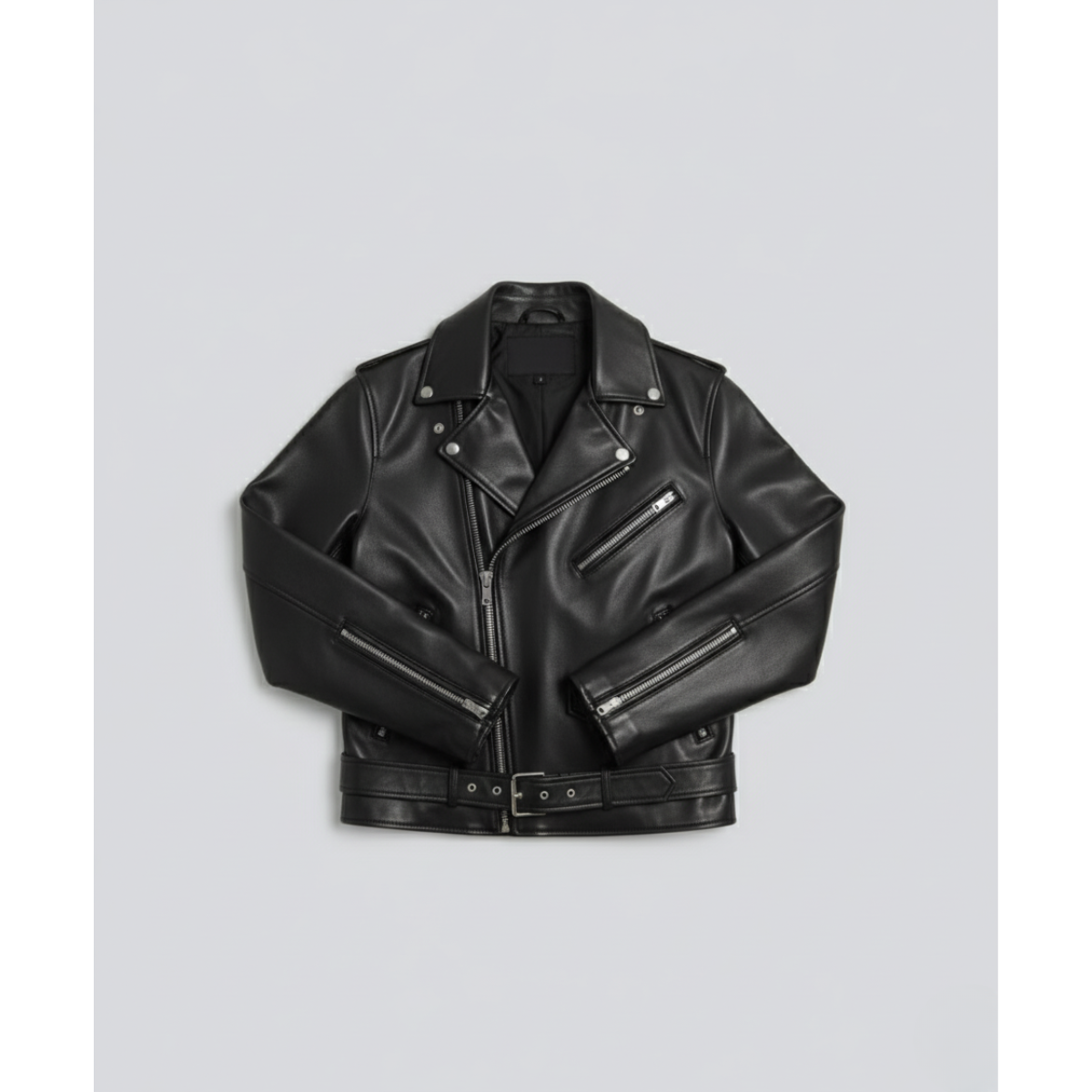 Front view of The Vizier's Vanguard Biker Leather Jacket, a high-quality black biker leather jacket featuring an asymmetrical zip closure, wide notched lapels, silver hardware, zip cuffs, and an adjustable belted waist.